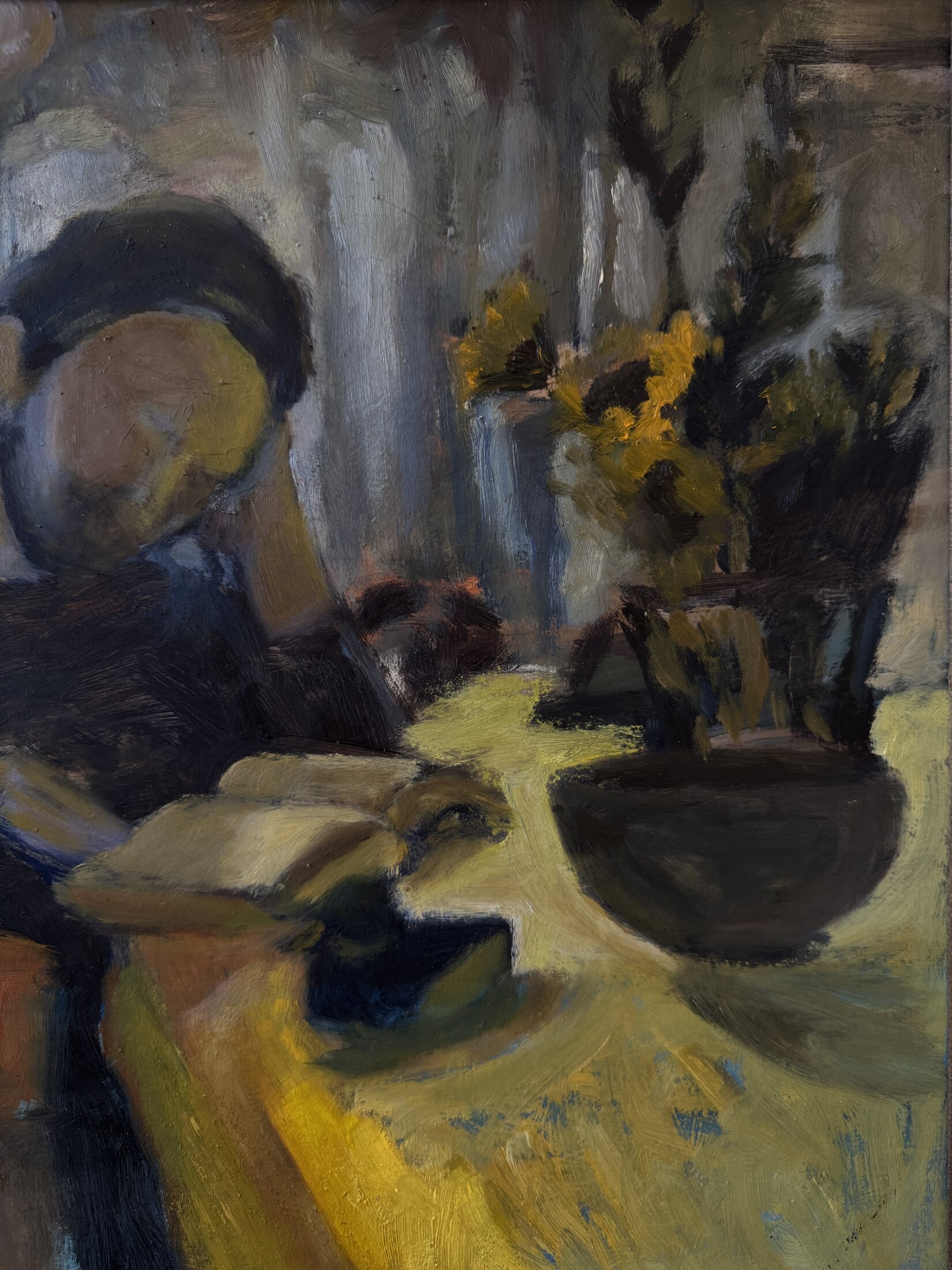 Oil painting of a figure reading at a table with sunflowers
